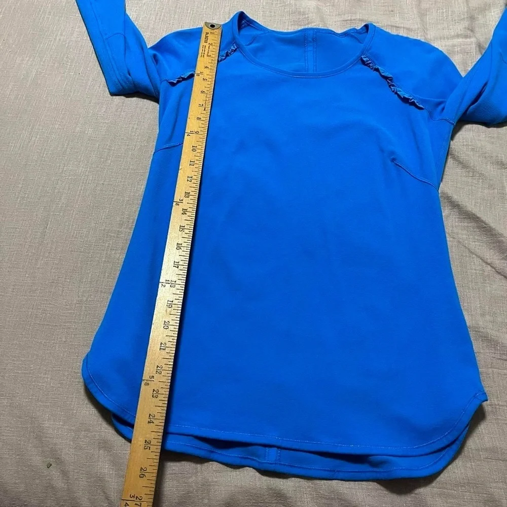 Retired Lululemon Runder Under Long Sleeve in Beaming Blue Size 6 Thumb Ruffles